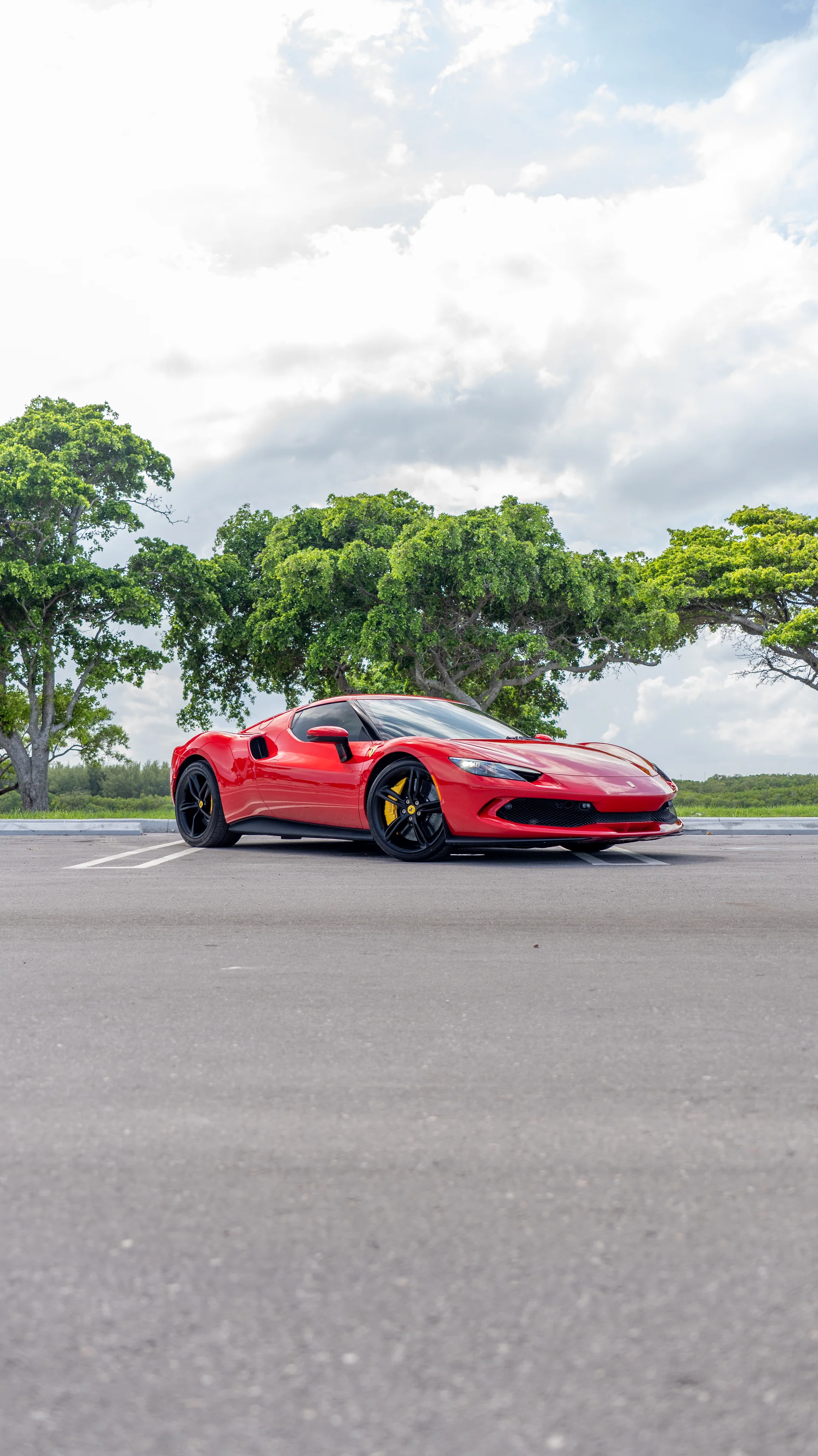 Ferrari 296 GTB rental — exterior front three-quarter view